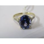 14ct YELLOW GOLD TANZANITE & DIAMOND RING, principal oval cut tanzanite in excess of 2cts with