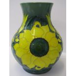 MOORCROFT, green ground "Sunflower" trial pattern baluster vase, 9.5" height