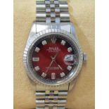 ROLEX WRIST WATCH, Gentleman's Rolex Oyster wrist watch with date aperture, unusual red sunburst