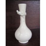 ORIENTAL CERAMICS, Blanc-de-chine 5.75" spill vase, decorated with applied Dragon Beast