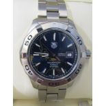 TAG HEUER AQUARACER AUTOMATIC GENTLEMANS WRIST WATCH, inner and outer box and papers, appears in