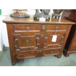 CROMWELLIAN CHEST, oak geometric fielded triple drawer straight fronted chest, antique design cast