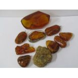 AMBER, selection of raw and part polished amber, some jewellery, some loose pieces