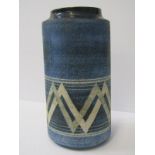 TROIKA, blue ground cylindrical white pyramid pattern, 7.75" vase, signed AP