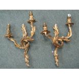 ORNATE BRASS WALL LIGHT FITTINGS, a pair of foliate decorated twin wall light fittings, 17"