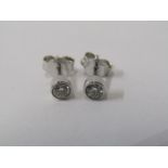 PAIR OF 18ct WHITE GOLD DIAMOND STUD EARRINGS, total diamond weight of 0.4ct, bright well matched