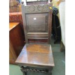 EARLY OAK HIGHBACK CHAIR, panelled back with floral carved cresting and barley twist stretcher