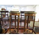 PAIR OF EMPIRE-DESIGN VASE STANDS, pair of parquetry circular top vase stands with pierced brass