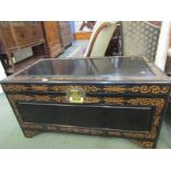 ORIENTAL FURNITURE, camphorwood chest with ebonised and carved decoration with brass key lock, 39.5"