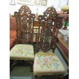RENAISSANCE REVIVAL CHAIRS, pair of ornate carved highback chairs with floral tapestry seats and X