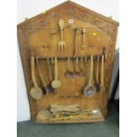 KITCHEN ANTIQUES, carved framework treen kitchen tool rack with utensils, 45" height