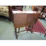 EDWARDIAN SUTHERLAND TABLE, mahogany dropleaf table on tapering twin pillar supports, 24" width