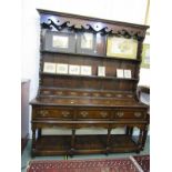 GEORGIAN DESIGN OAK DRESSER, cross banded dresser of triple frieze drawers above open shelf base,