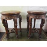 ORIENTAL VASE STANDS, pair of Eastern carved hardwood circular topped high vase stands, 18.5" height