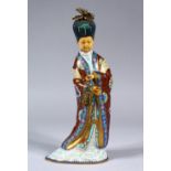 A 20TH CENTURY CHINESE CLOISONNE FIGURE OF GUANYIN, stood in traditional robes holding an object,