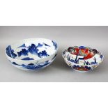 TWO JAPANESE MEIJI / TAISHO PERIOD BLUE & WHITE / IMARI PORCELAIN BOWLS, the fist a large blue &