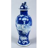A GOOD 19TH CENTURY CHINESE BLUE & WHITE PORCELAIN BALUSTER VASE & COVER, the body decorated with