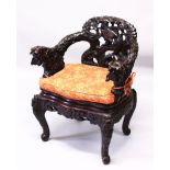 A HEAVY QUALITY 19TH CENTURY JAPANESE/CHINESE CARVED HARDWOOD ARM CHAIR, the cair deeply carved