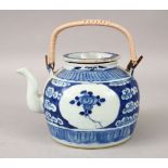 A 19TH CENTURY CHINESE BLUE & WHITE PORCELAIN TEAPOT & COVER, the teapot decorated with panels of