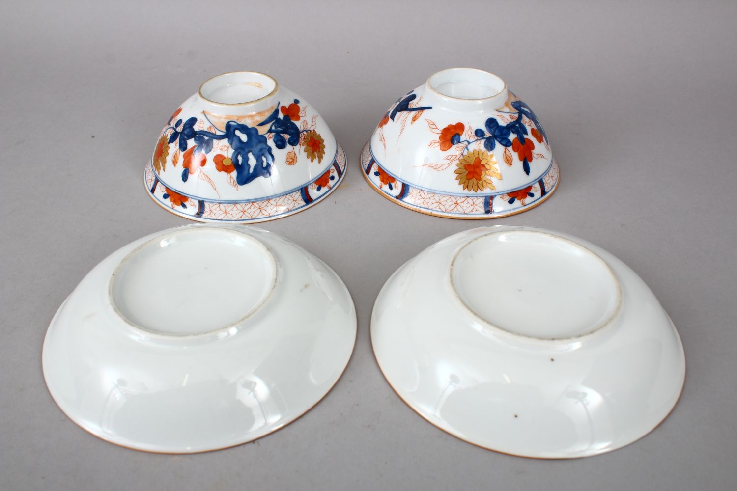 A PAIR OF 19TH / 20TH CENTURY CHINESE IMARI PORCELAIN CUPS & SAUCERS, decorated in the typical imari - Image 2 of 2