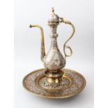 A GOOD 19TH/20TH CENTURY ISLAMIC DAMASCUS MAMLUK REVIVAL BRASS EWER AND BASIN, inlaid all over