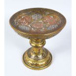 A 19TH CENTURY CAIROWARE BRASS PEDESTAL STAND, inlaid with silver and copper, with calligraphy and
