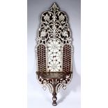 A 19TH CENTURY ISLAMIC CARVED WOOD AND MOTHER OF PEARL WALL HANGING / KAVAKLUK, the carved