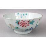 AN 18TH CENTURY CHINESE QIANLONG EXPORT FAMILLE ROSE PORCELAIN RIBBED BOWL, the bowl decorated