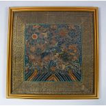 A GOOD QUALITY FRAMEED 18TH / 19TH CENTURY CHINESE EMBROIDERED MANDARIN RANK BADGE, with scenes of a