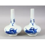 A GOOD PAIR OF CHINESE REPUBLIC STYLE BLUE & WHITE PORCELAIN VASES, decorated with scenes of