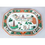 A GOOD 18TH CENTURY CHINESE FAMILLE VERTE PORCELAIN SERVING DISH, the decoration of a native