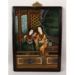 A 20TH CENTURY CHINESE REVERSE PAINTED GLASS HANGING PICTURE, depicting the scene of two ladies