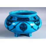 A MINTON TURQUOISE GLAZED CIRCULAR BOWL FOR THE ISLAMIC MARKET, on four moulded feet, 23cm