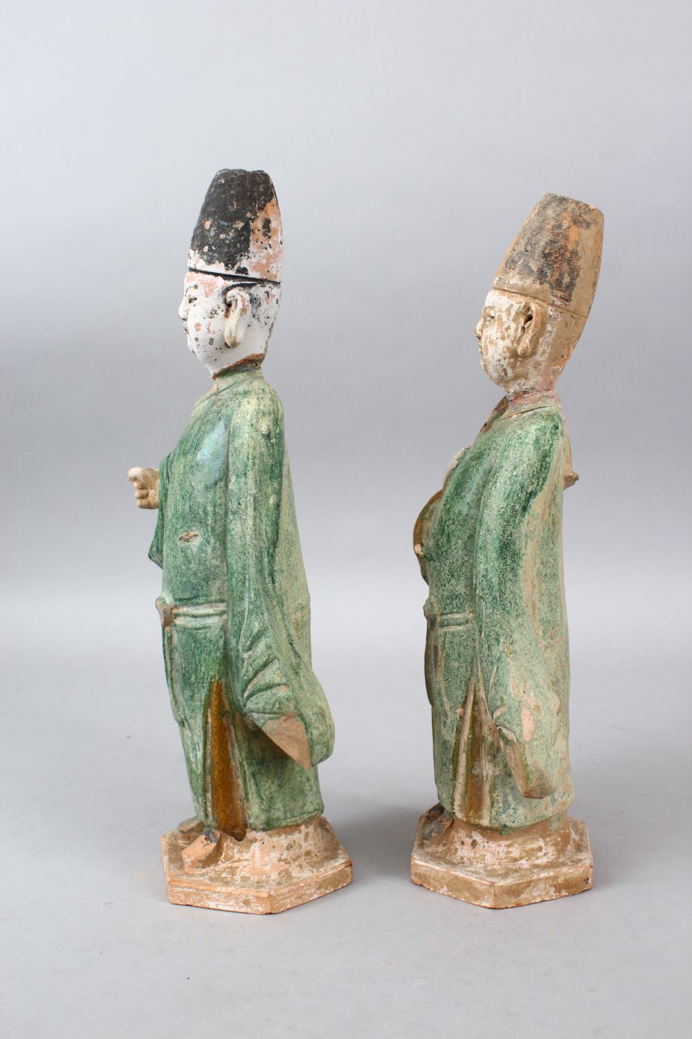 A PAIR OF 19TH CENTURY MING STYLE TERRACOTTA FIGURES OF MEN, the bodies with painted detailing, 35cm - Image 4 of 5