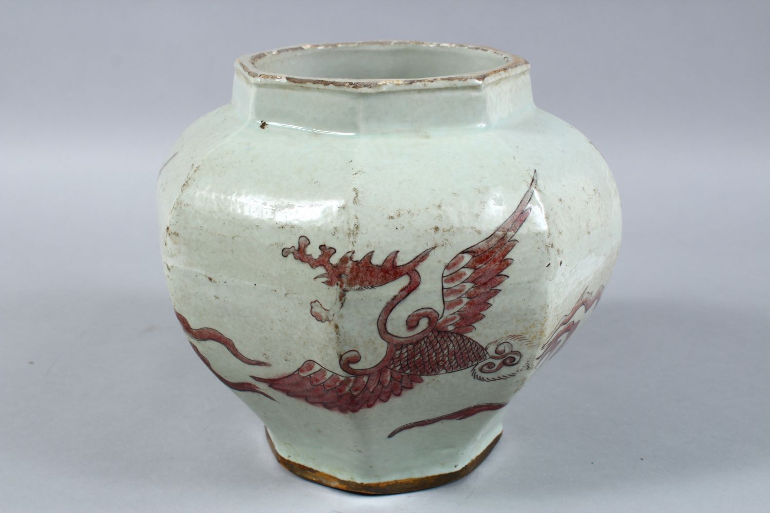 A CHINESE IRON RED DECORATED OCTAGONAL PORCELAIN JAR, the body of the jar decorated in iron red to - Image 3 of 8