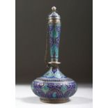 A 19TH CENTURY INDIAN CASHMIRI ENAMELLED SILVER ROSEWATER SPRINKLER, of bottle form, 15cm high.