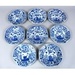 EIGHT CHINESE 18TH CENTURY KANGXI PORCELAIN BLUE & WHITE PLATES, each decorated with similar