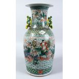 A GOOD 19TH CENTURY CHINESE FAMILLE VERTE PORCELAIN VASE, the body of the vase decorated with a wave