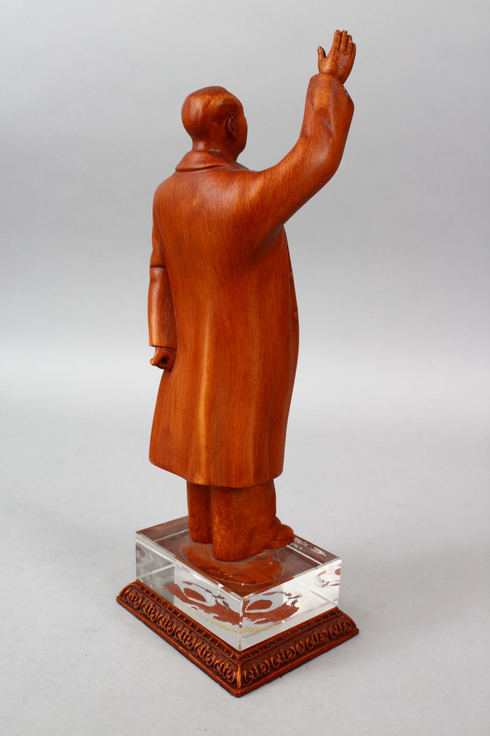 A 20TH CENTURY CHINESE CARVED HARDWOOD FIGURE OF MAO ZEDONG, stood with his hand aloft, upon a glass - Image 2 of 4