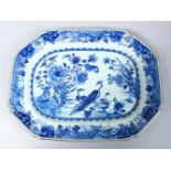 A GOOD 19TH CENTURY CHINESE BLUE & WHITE PORCELAIN SERVING DISH, decorated with scenes of peacocks