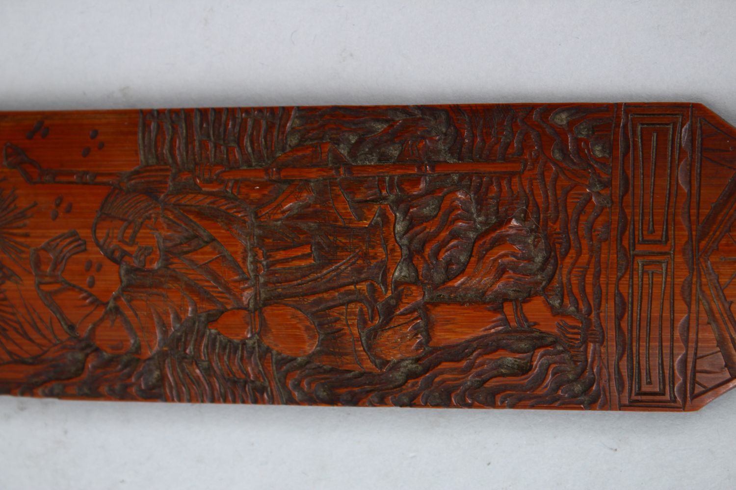 A 20TH CENTURY CHINESE CARVED BAMBOO PAGE TURNER, carved in relief with scenes of a figure in a - Image 2 of 3