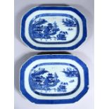 A PAIR OF 18TH CENTURY CHINESE QIANLONG BLUE & WHITE OCTAGONAL PORCELAIN PLATTERS, each decorated