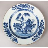 AN 18TH CENTURY CHINESE QIANLONG BLUE & WHITE PORCELAIN DISH, decorated with a native landscape