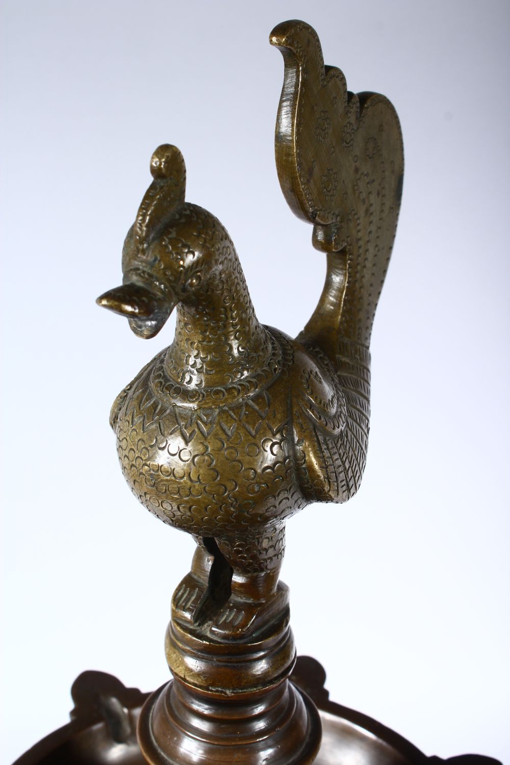 A GOOD 19TH CENTURY INDIAN BRONZE LAMP, with cockerel finial on a circular base, 60cm high. - Image 3 of 4