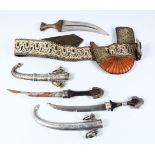 THREE 19TH CENTURY OR EARLIER ISLAMIC JAMBIYA / INLAID DAGGERS, comsisting of two inlaid and
