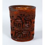 A GOOD CHINESE 19TH / 20TH CENTURY CANTON CARVED BAMBOO BRUSH POT, depicting scenes of figures