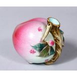 A GOOD 20TH CENTURY CHINESE FAMILLE ROSE PORCELAIN MODEL OF A PEACH / WATER DROPPER, the vessel in