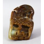 A GOOD 19TH CENTURY CHINESE CARVED JADE LANDSCAPE PEBBLE, the pebble carved in great detail to
