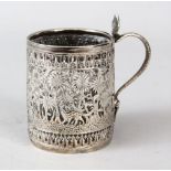 A 19TH CENTURY INDIAN KASHMIR SILVER BEAKER / CUP, with embossed decoration of animals and flora