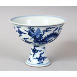 A GOOD CHINESE MING STYLE BLUE & WHITE PORCELAIN STEM CUP, the cup decorated with dragons and